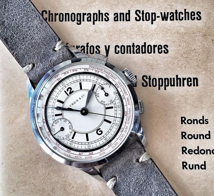 3. White sector dial, steel case, black print with red tachy scale