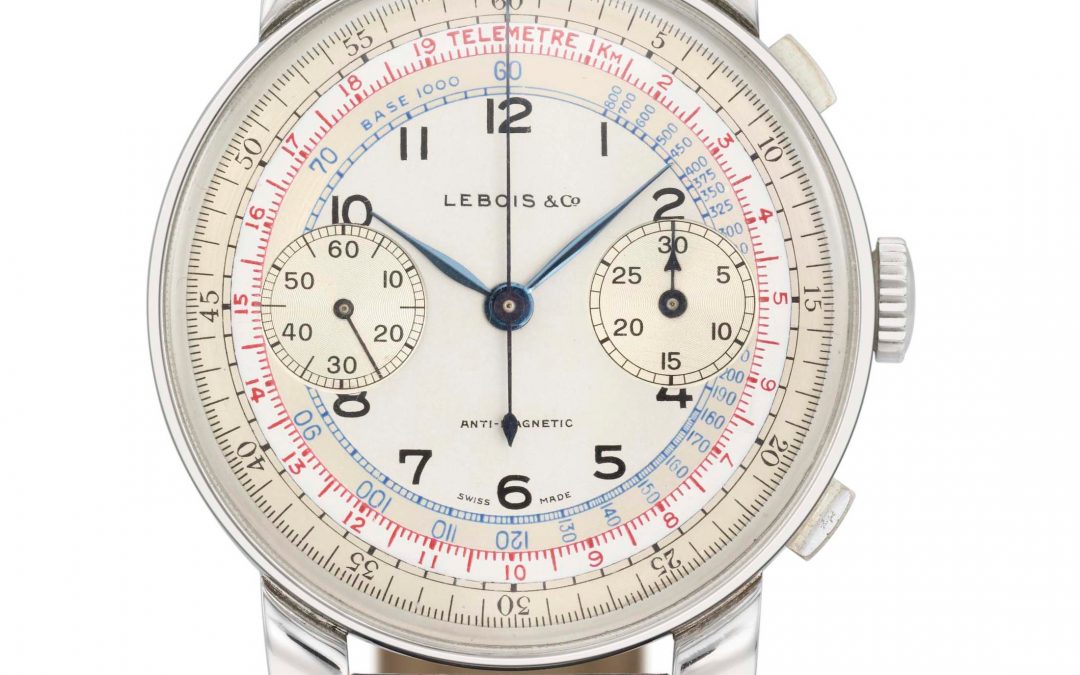 5. Cream dial, blue leaf hands, steel case, black print, multicolored scales
